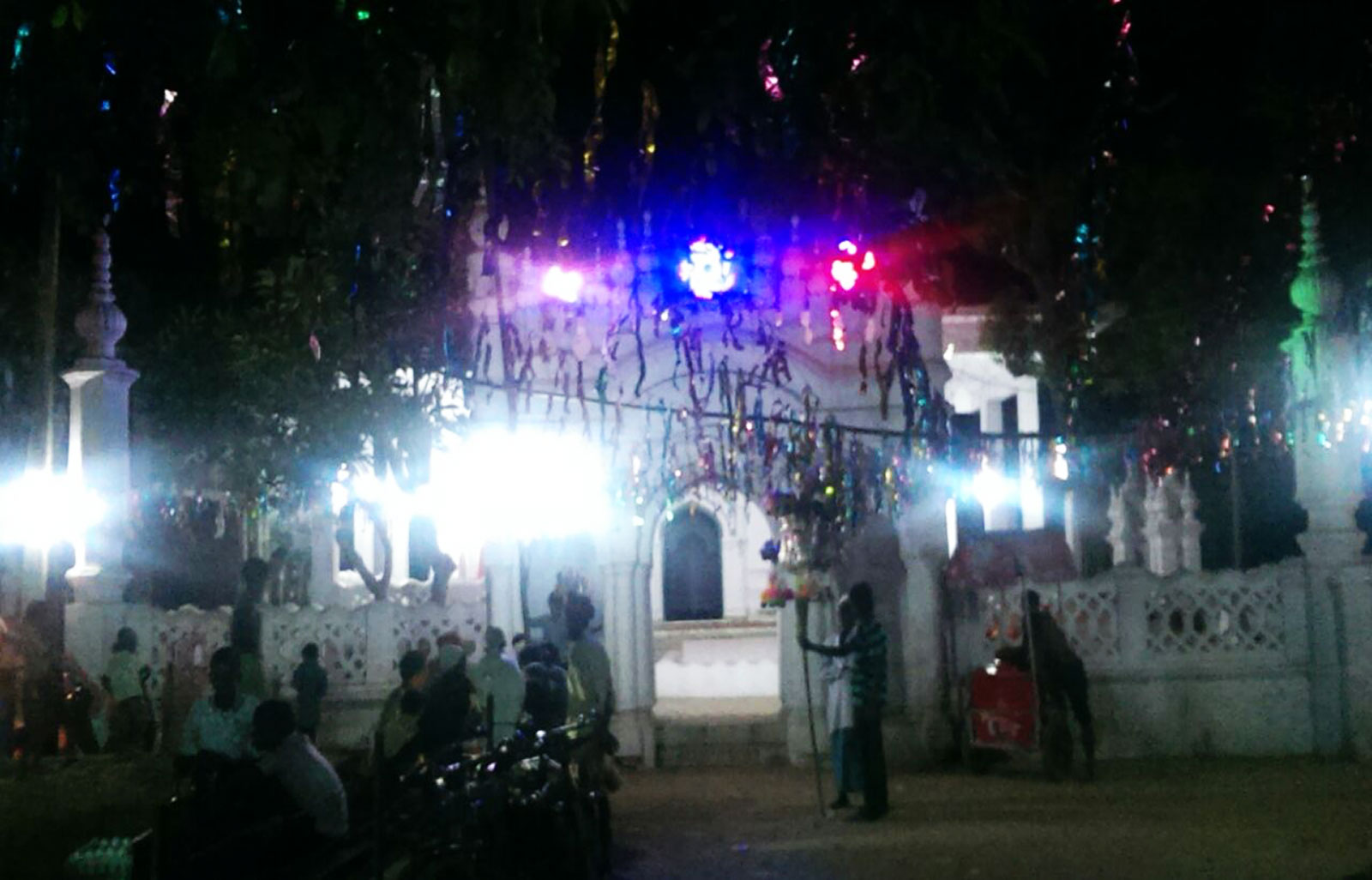 Bazidpur shrine illuminated at night during Urs